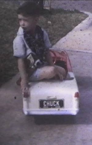 Chuck in a toy car - old photo