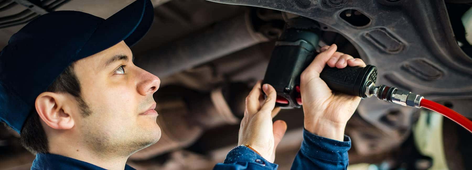 Brake picture of technician working on car