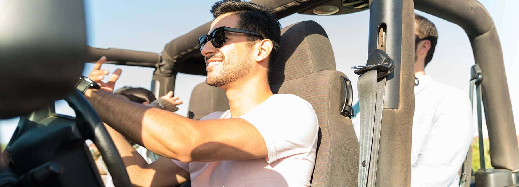 Happy Passengers in an open air vehicle