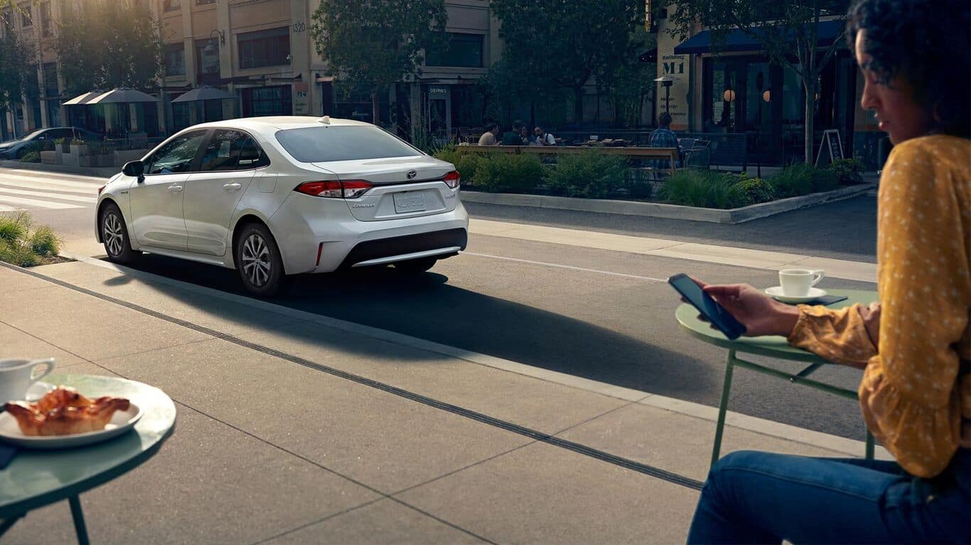 2020 Toyota Corolla parked by cafe