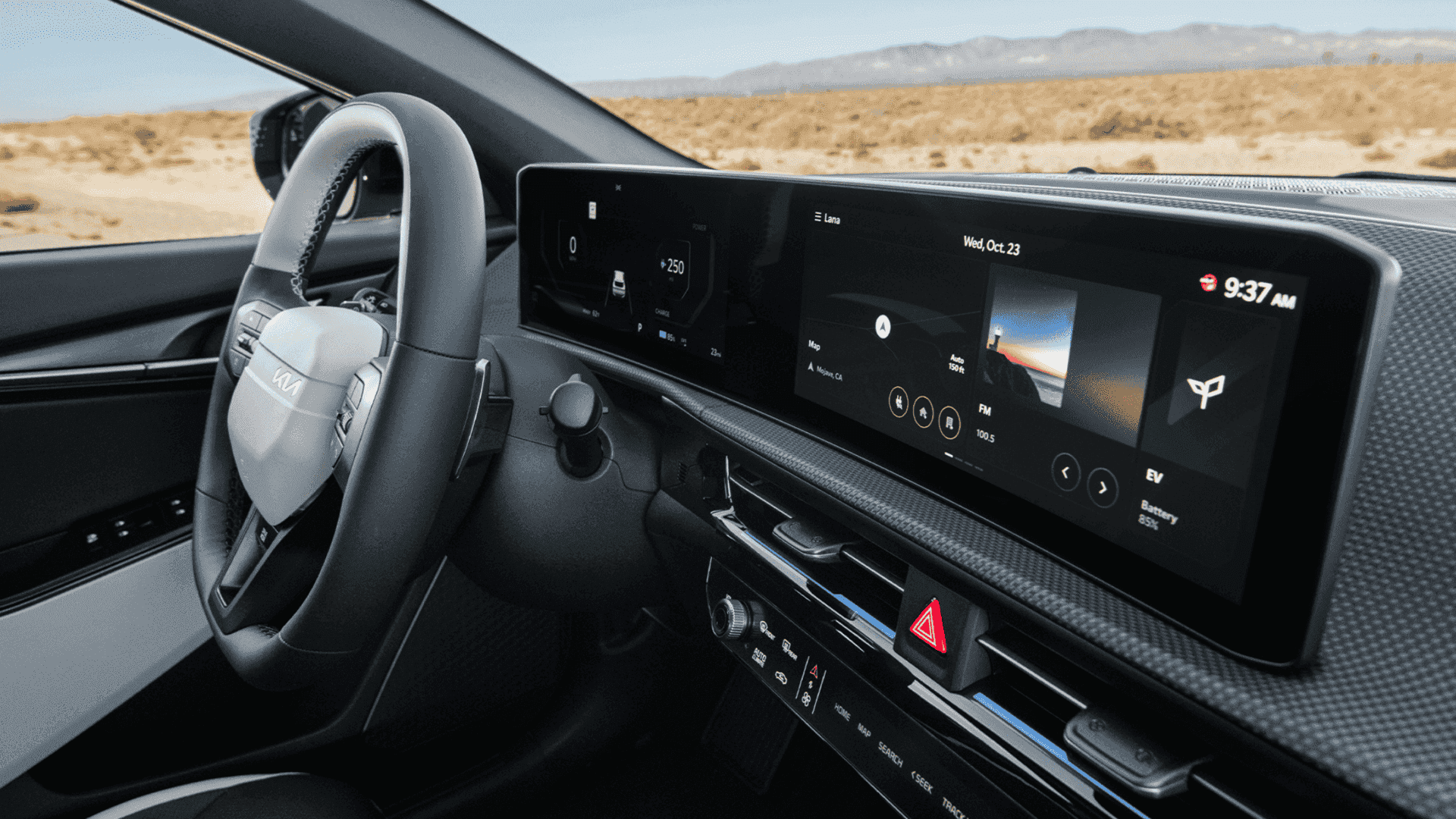 Close-up of the 2025 Kia EV6 digital cockpit featuring a panoramic curved display with EV navigation, infotainment, and driver assist functions.