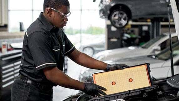 Mercedes-Benz mechanic working on a vehicle
