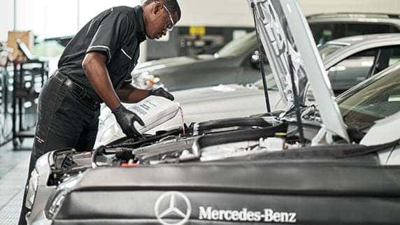 Mercedes-Benz mechanic working on a vehicle