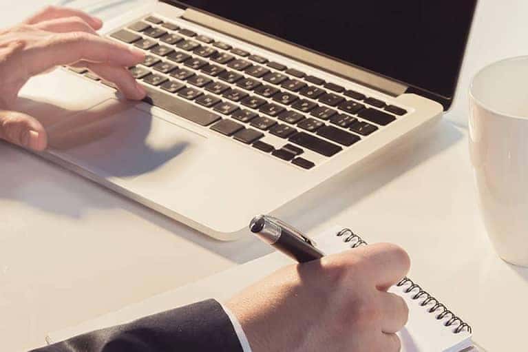 man's hands on keyboard