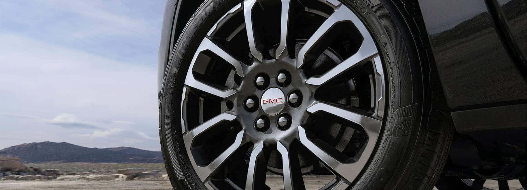 2020 GMC Acadia Denali Luxury SUV exterior front wheel
