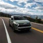 2023 Kia Sportage X Pro silver hilly road