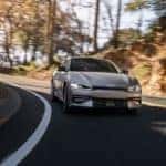 2022 Kia EV6 silver rounding the bend