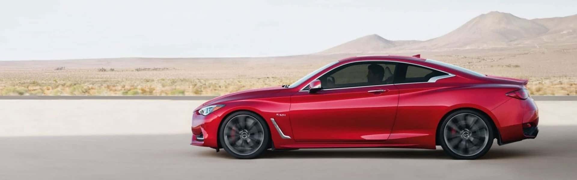 2020 Q60 Side View Driving Down Street