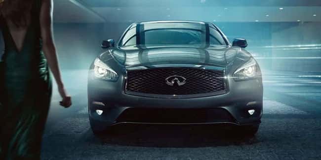 Woman Walking To Parked Q70
