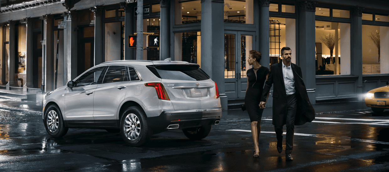 An exterior shot of a Cadillac dealership