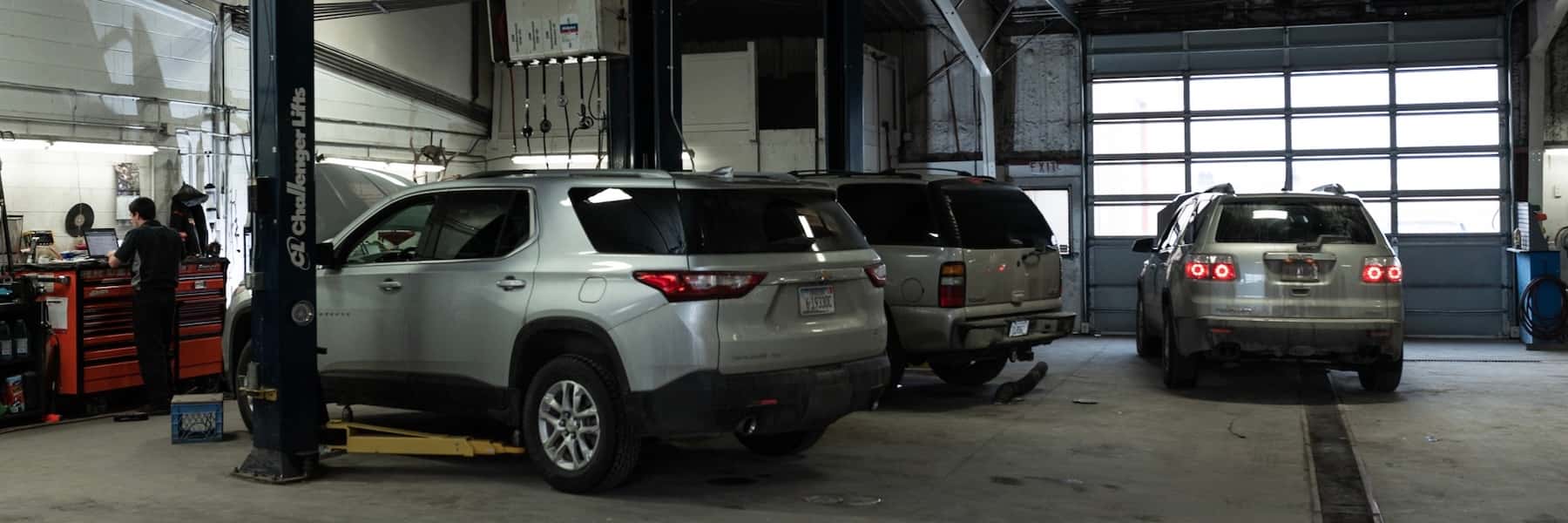 service specialist working under vehicle