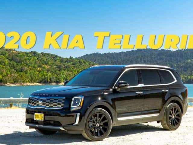 2020 Kia Telluride parked in front of a lake.