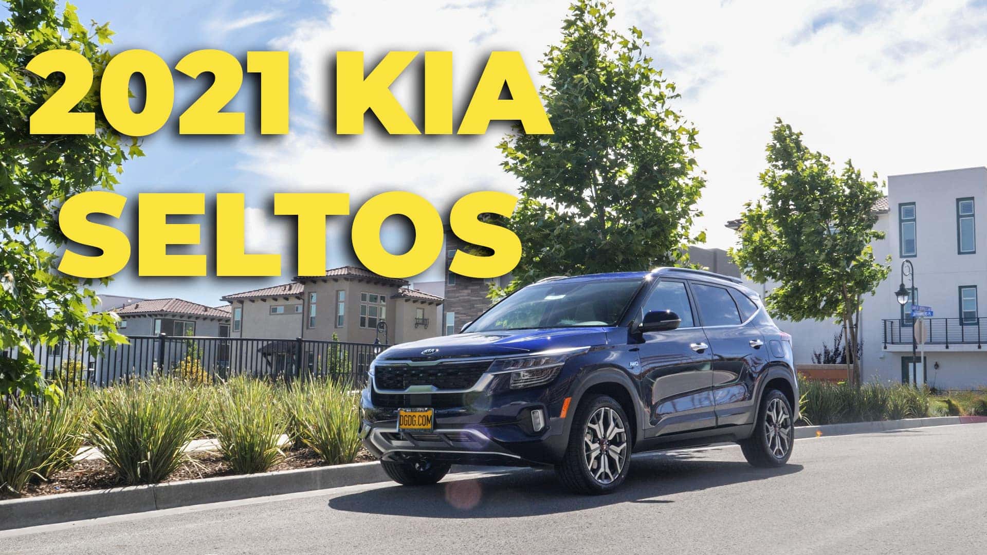 2021 Kia Seltos 5X Turbo parked in front of apartment complexes.