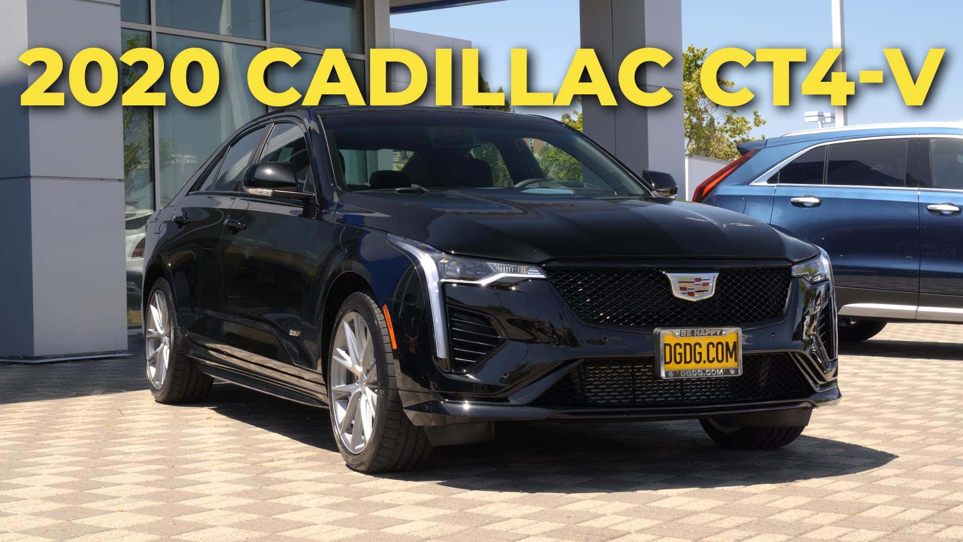 2020 Cadillac CT4-V parked in front of a building.