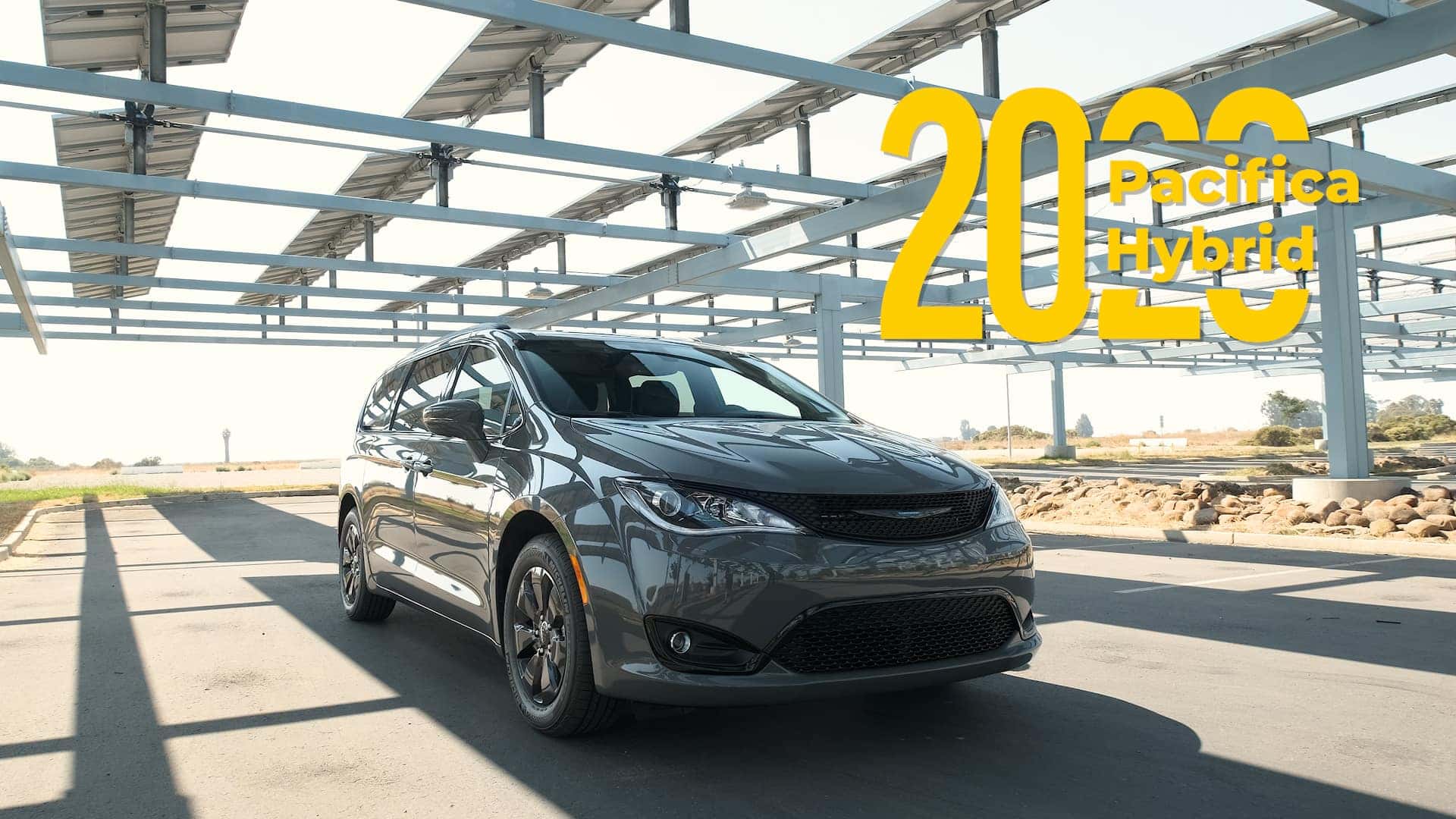 2020 Chrysler Pacifica Hybrid parked underneath a solar panel