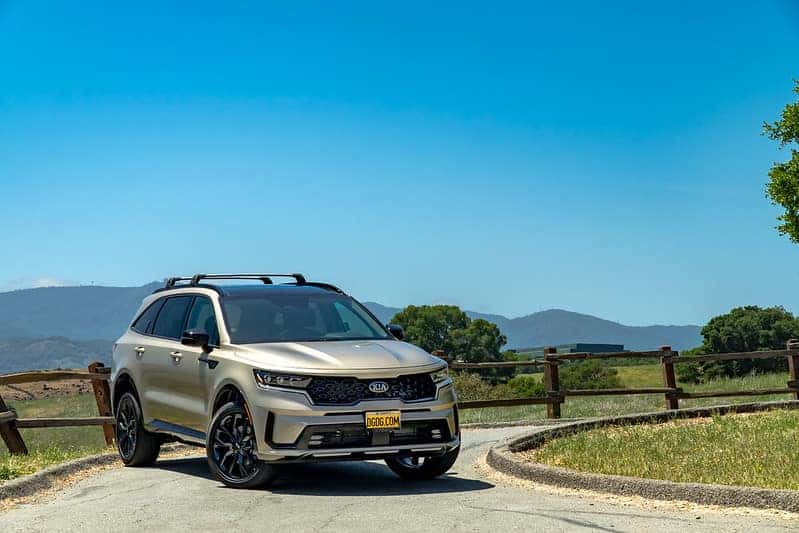 2021 Kia Sorento parked in front of a field