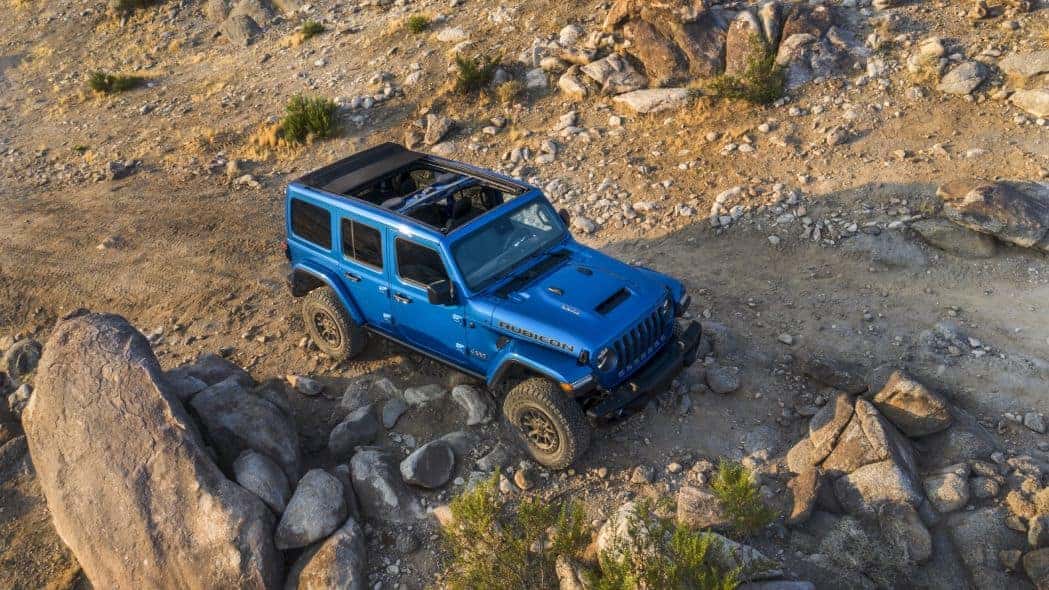 2021 Jeep® Wrangler Rubicon 392 driving on a rocky terrain