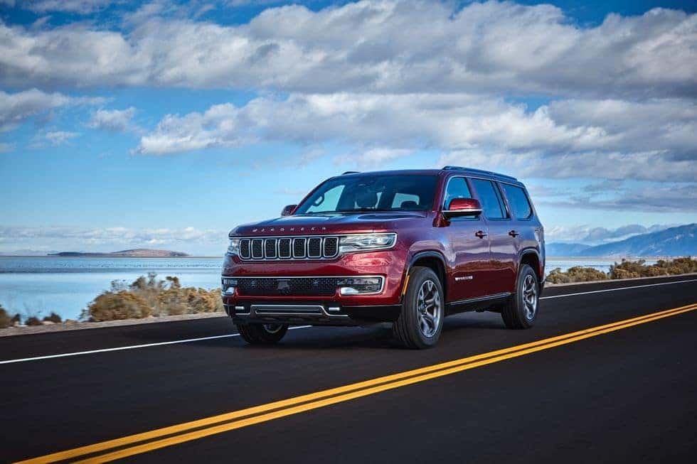 2022 Jeep Wagoneer driving down the highway.