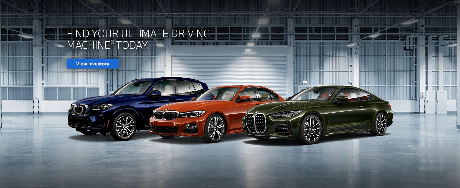 Blue X3, Orange 3 series, green 4 series coupe lined up in garage.