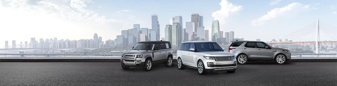 land rover lineup with metropolitan background