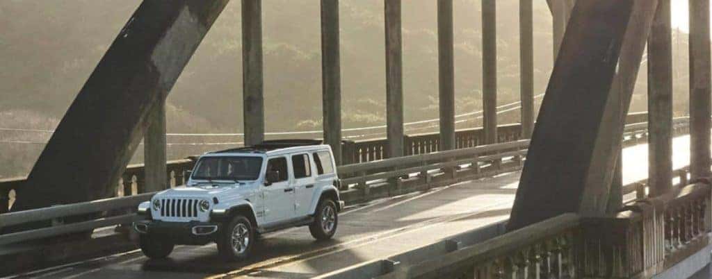 jeep-wrangler-driving-over-bridge