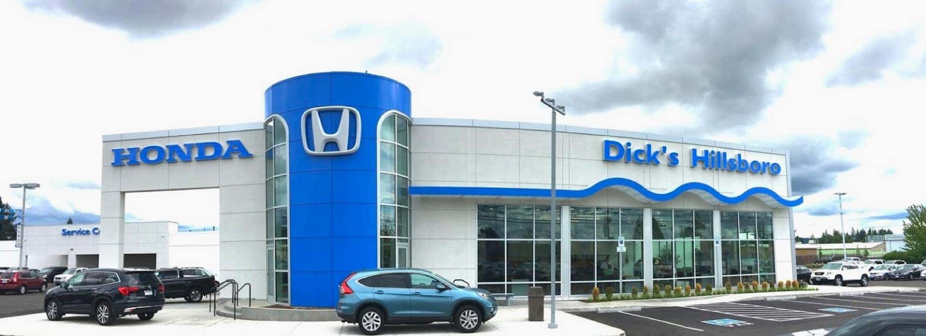 An exterior shot of a Honda dealership