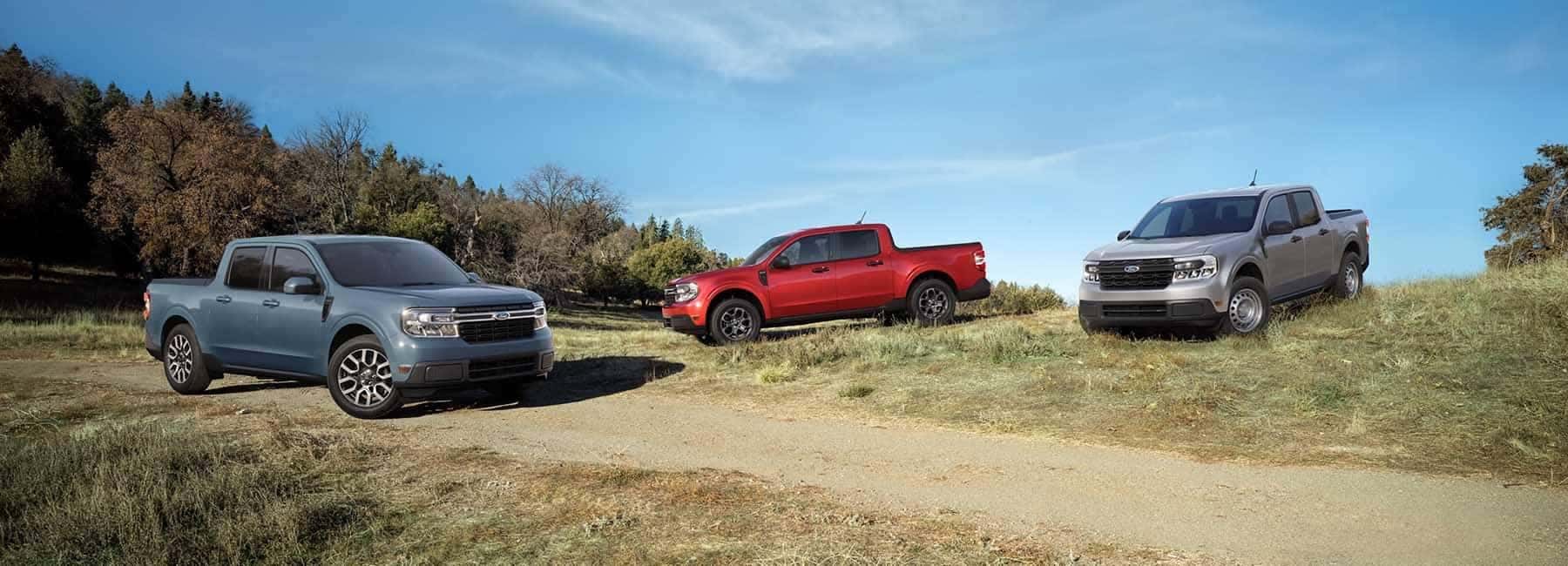 Don Vance Ford | Three 2023 Maverick parked in field