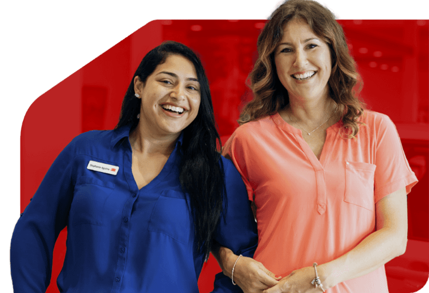 dealer-employee-locking-arms-with-customer
