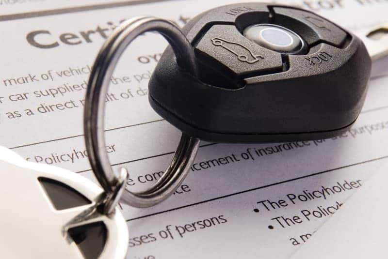 Car Keys On Insurance Documents