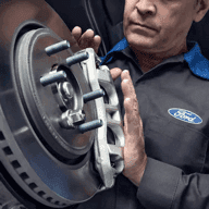 technician-installing brakes