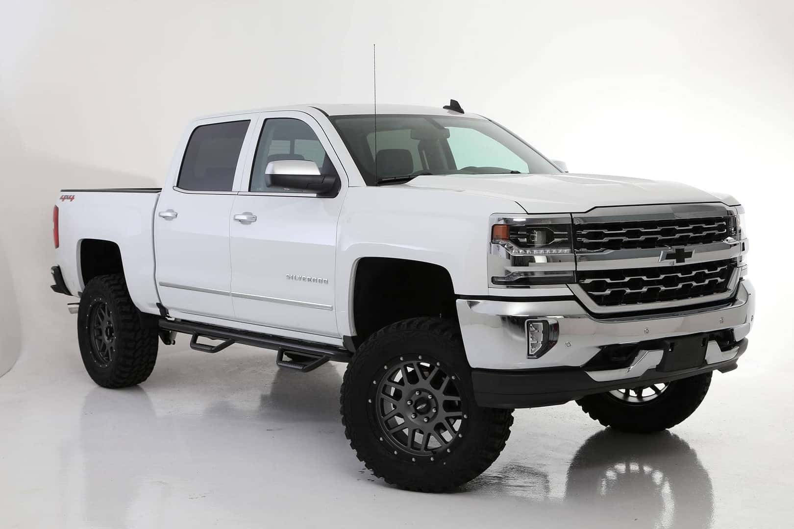 white lifted chevrolet silverado 2022