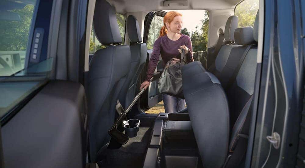The interior of a 2022 Ford Maverick shows the back seat.