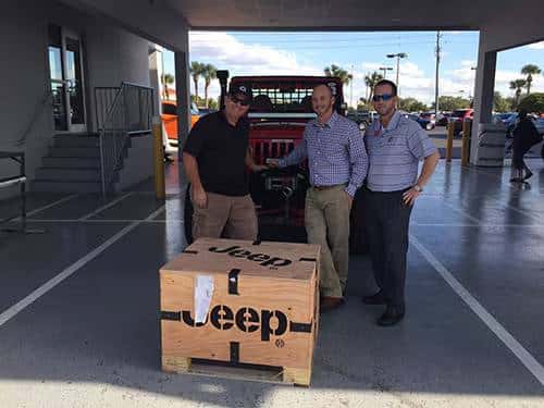Jeepin 4 Justice Event in front of a wrangler