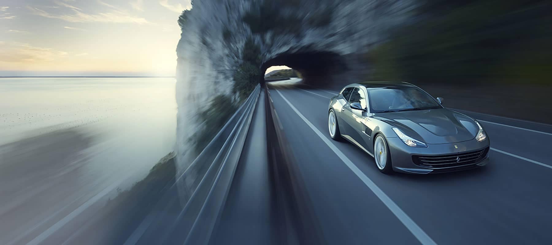 Ferrari-GTC4Lusso drives through tunnel on highway