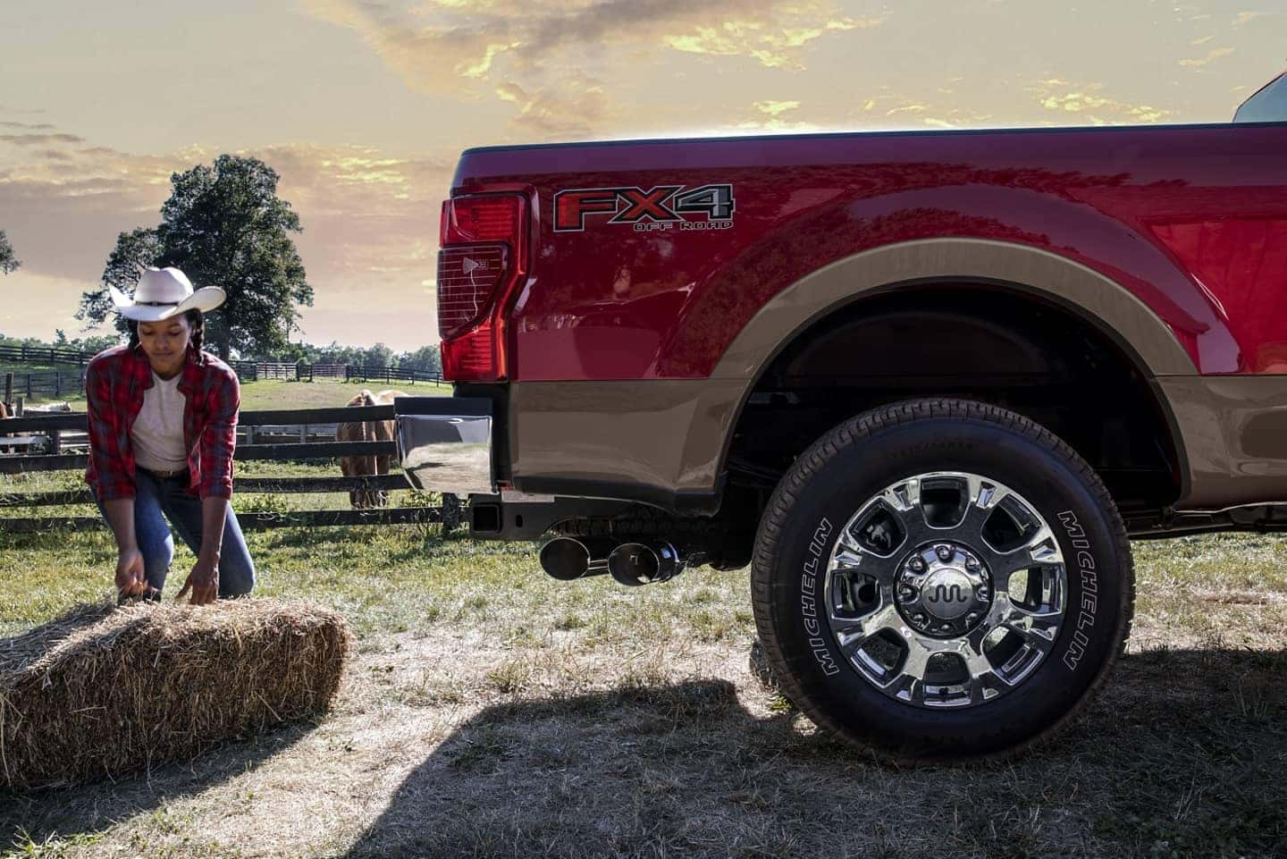 loading hay into a Ford Super Duty truck