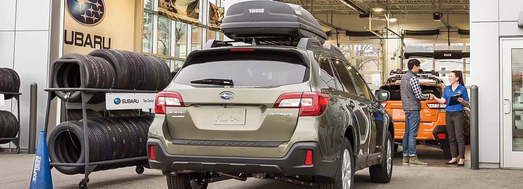 Subaru crossover parked at service entrance