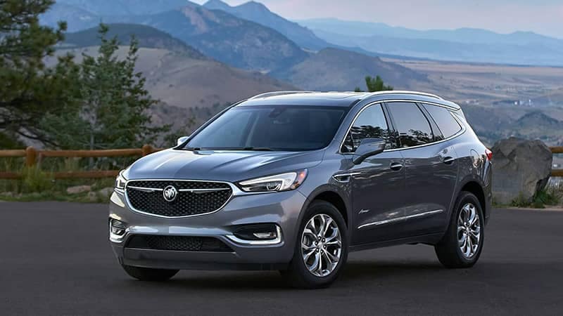 Grey 2020 Buick Enclave in Front of a House