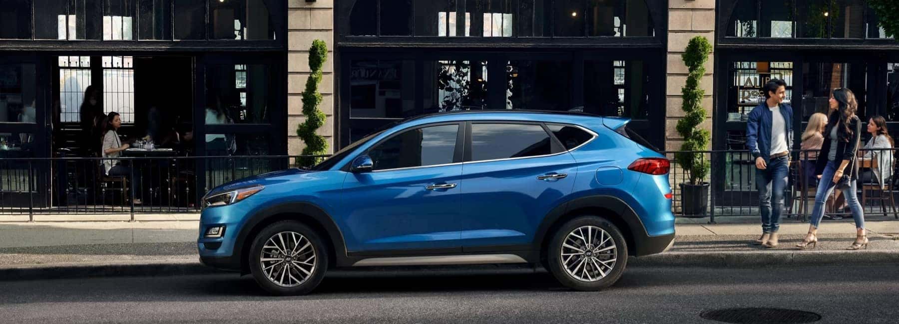 2021 Hyundai Tucson in blue parked on a city street