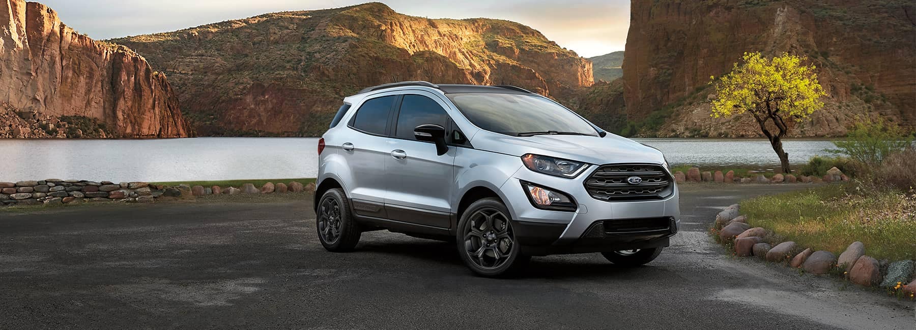 Silver 2021 Ford EcoSport parked on a river overlook in a canyon