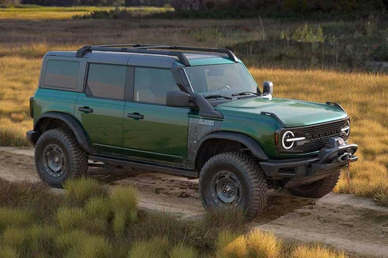 2023 Bronco driving down dirt road_mobile