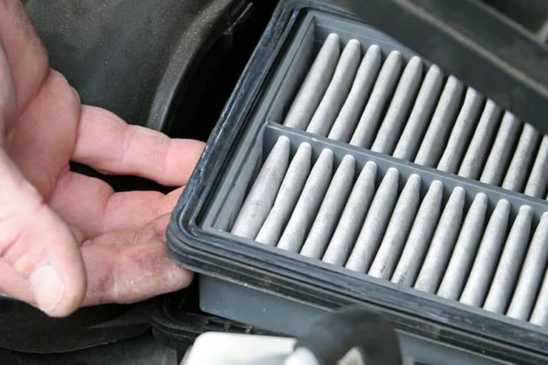 Changing an air filter in a vehicle