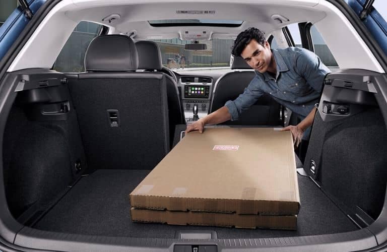 Interior view of the rear cargo area inside a 2020 Volkswagen Golf