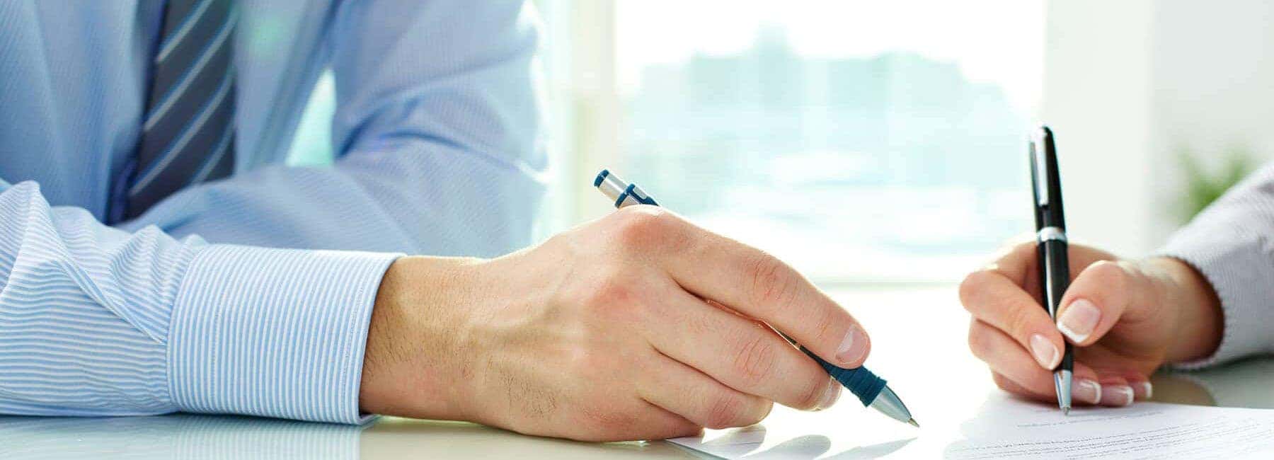 People going over paperwork together