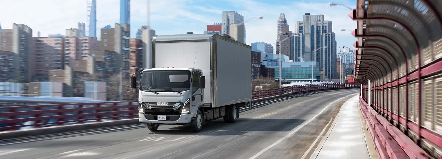 Isuzu-truck-driving-city-highway