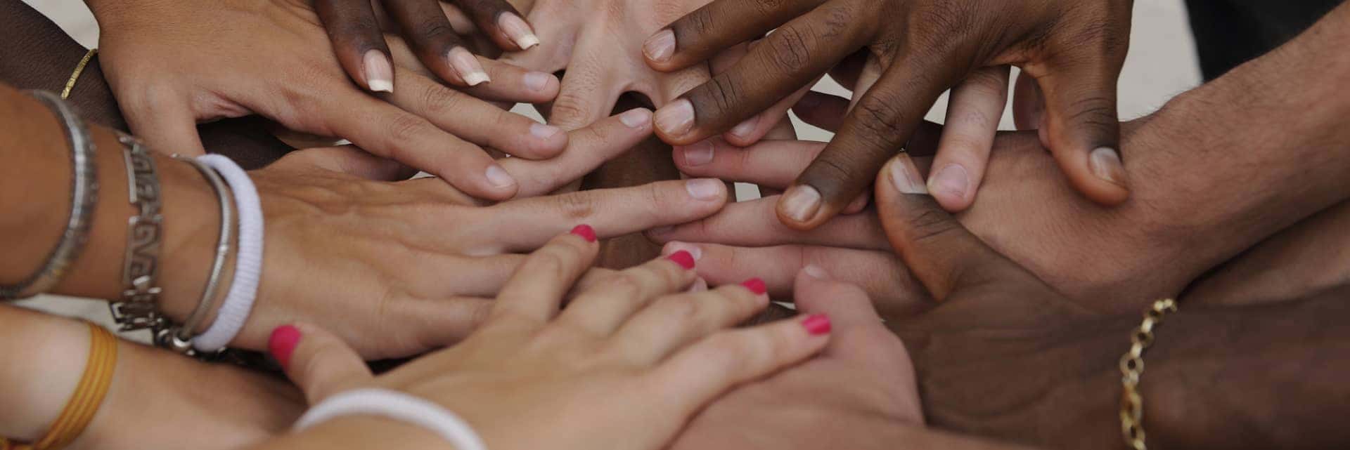 group-with-hands-in-mobile