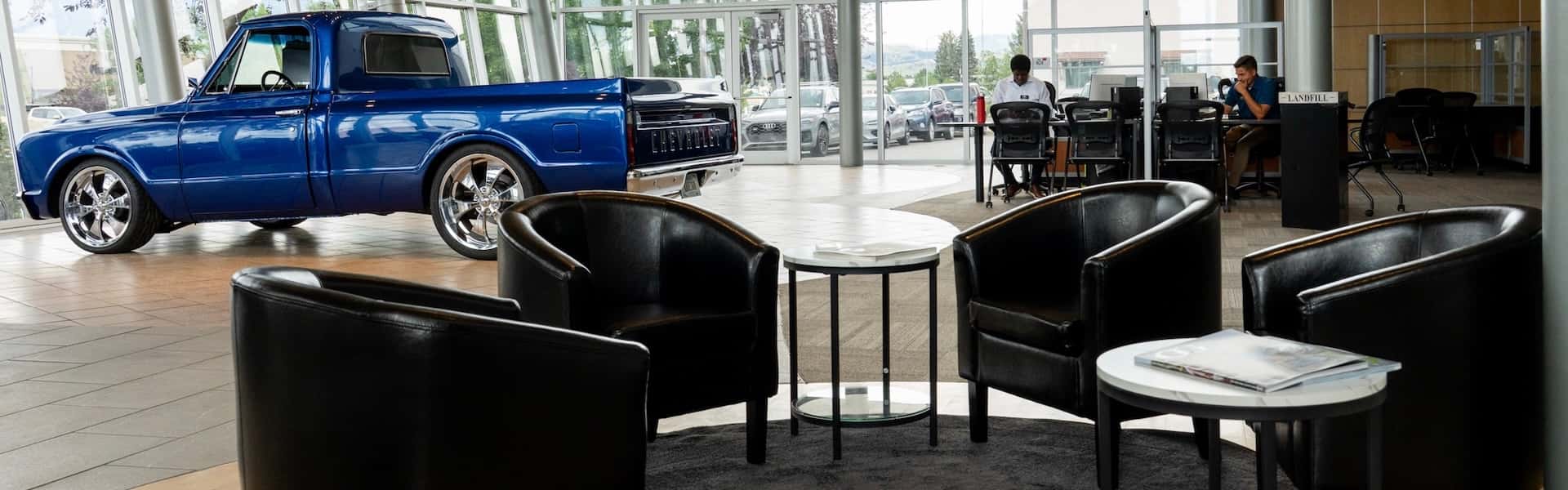 two people signing paper work