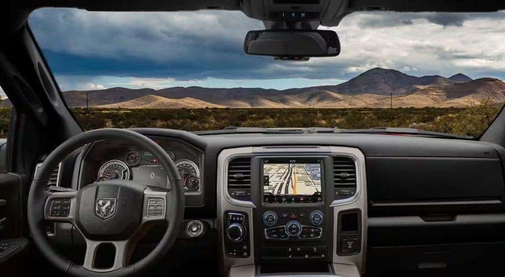 The black and grey interior is shown in a 2023 Ram 1500 Classic.
