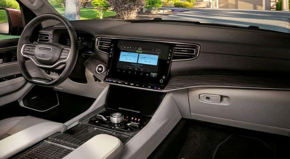 The black and grey interior is shown in a 2024 Jeep Wagoneer.