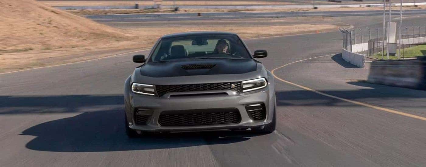 A grey 2023 Dodge Charger Scat Pack is shown from the front.