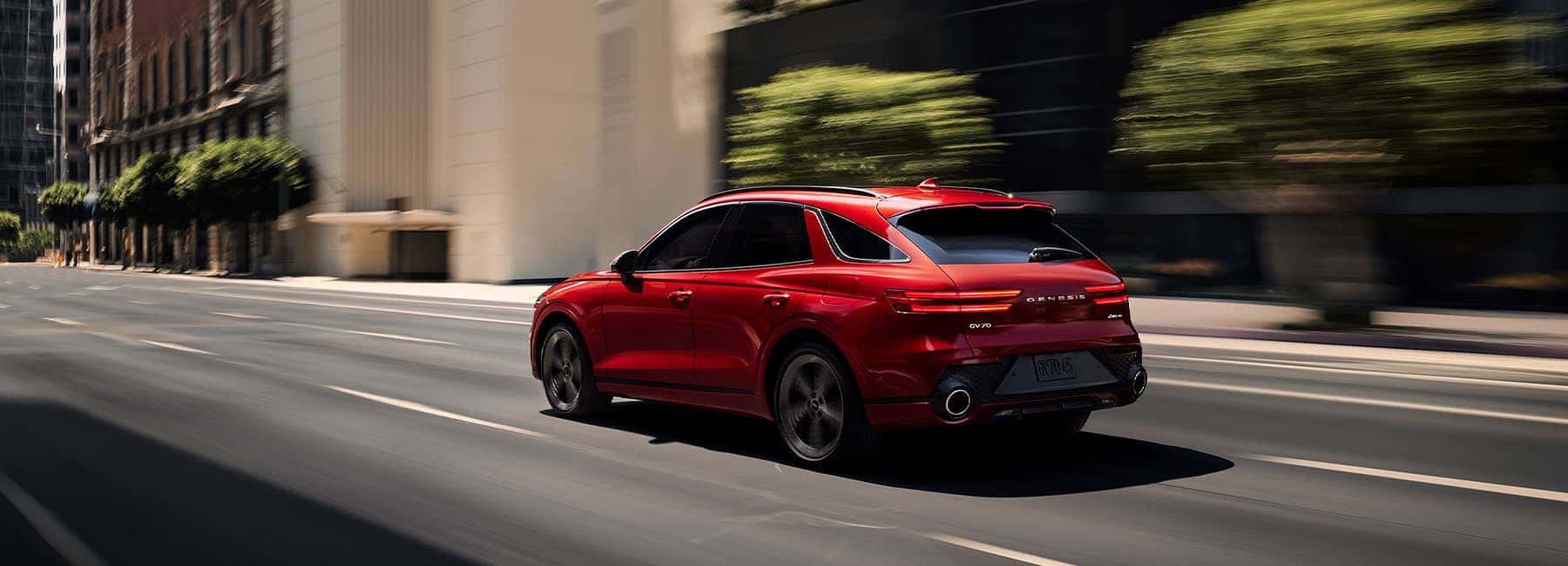 Mauna Red 2022 Genesis GV70 on a city road